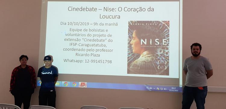 Foto: Nicoli, André e Vinicius, antes do início do cinedebate sobre o filme Nise